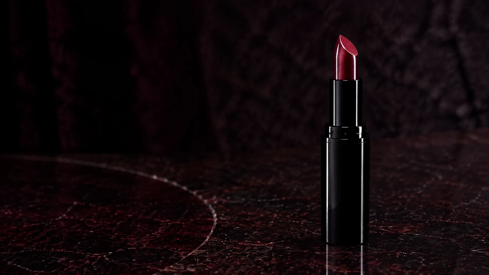 Black-cherry lipstick campaign in a wide storefront composition